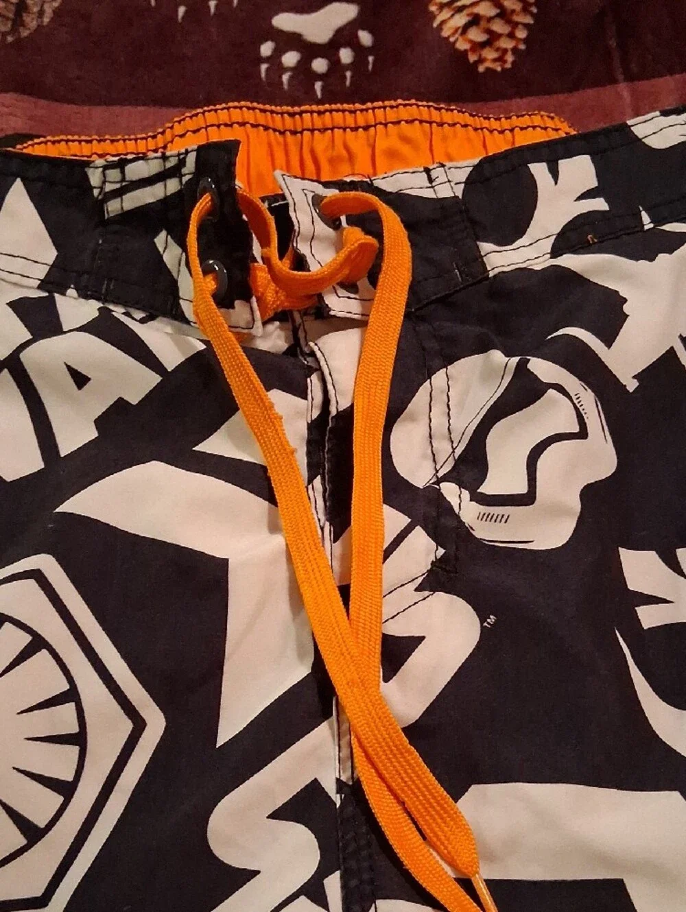 Star Wars Men’s Black and White Graphic Swim Board Shorts with Orange Drawstring
